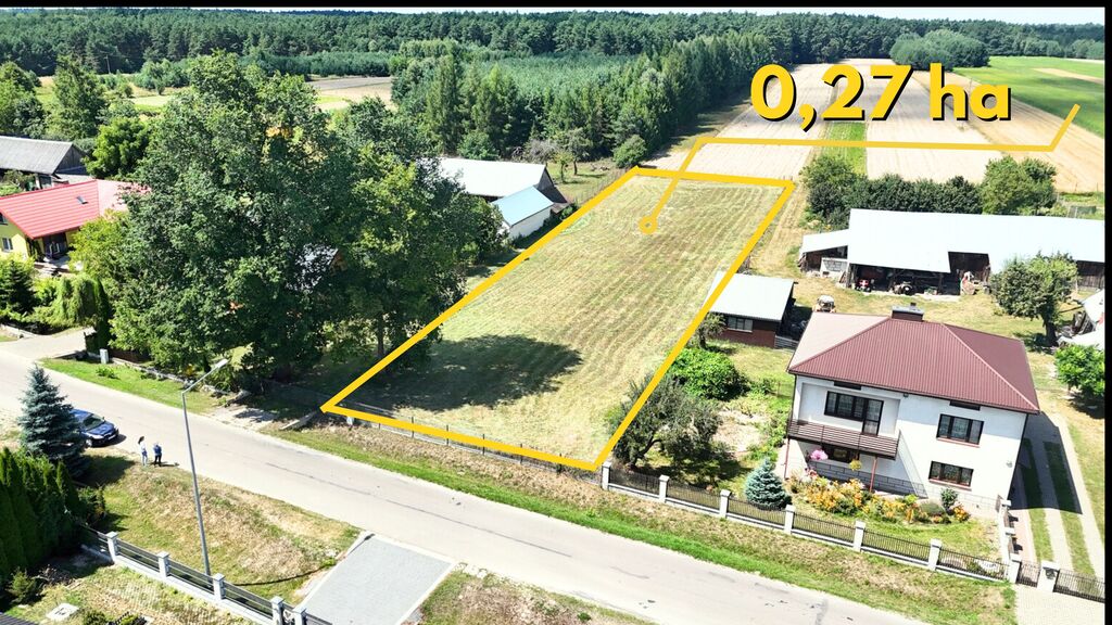 Ogrodzona działka przygotowana pod inwestycję