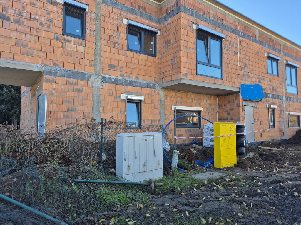 Dom w zabudowie bliźniaczej -os. Sienkiewicza