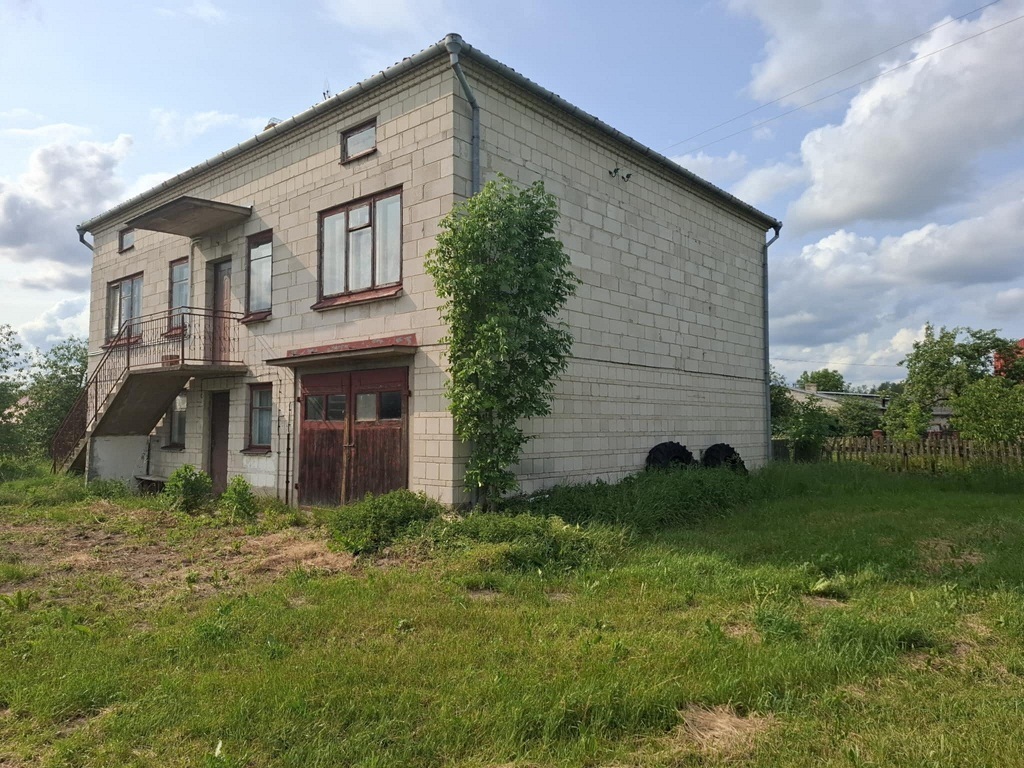 Gospodarstwo rolne z Domem i zabudowaniami .