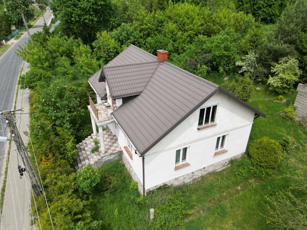 DOM z gankiem, poddaszem i słonecznym balkonem